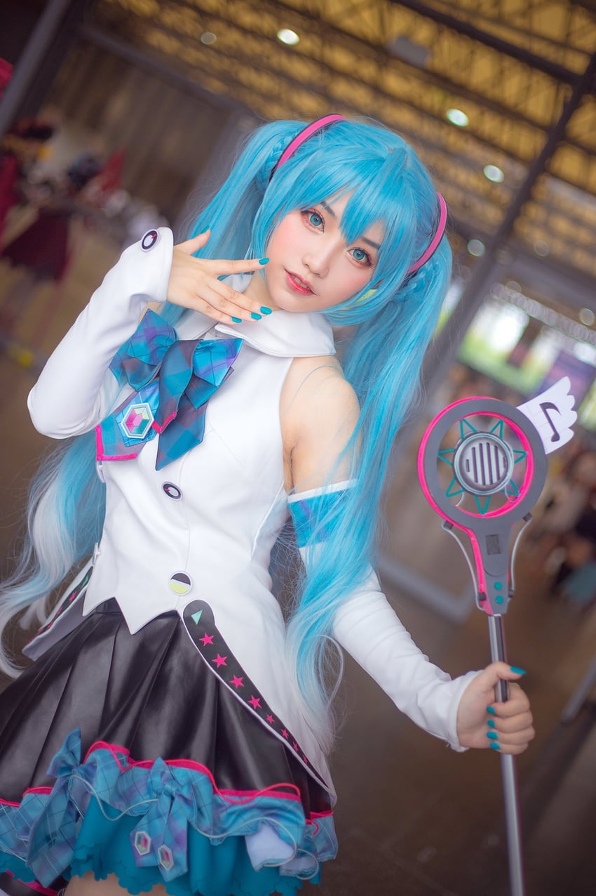 hatsune miku and magical mirai miku (vocaloid) by rakukoo